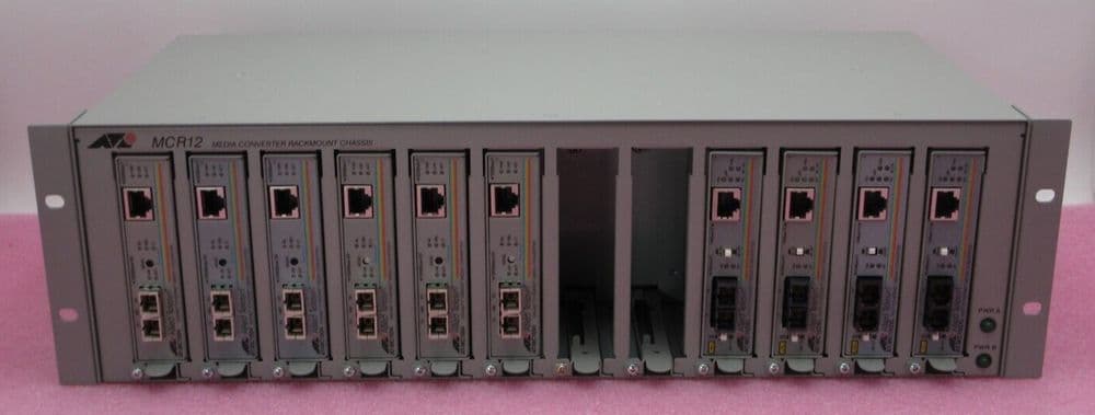 Allied Telesyn AT-MCR12 6 x 1Gb AT-MC1004 4 x 100Mb AT-MC102XL Media Converter