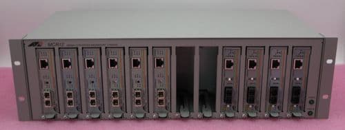 Allied Telesyn AT-MCR12 6 x 1Gb AT-MC1004 4 x 100Mb AT-MC102XL Media Converter