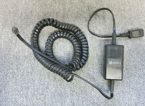 Aspect headset adapter amplifier used on ACD systems with the RNA feature