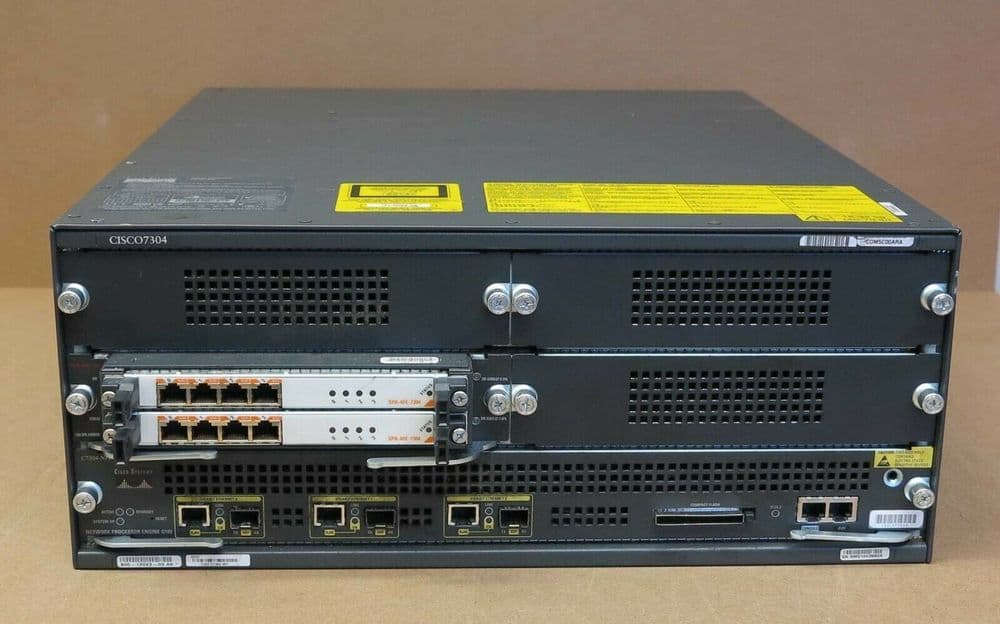Cisco 7304 Series 4-Slot Router Chassis 1x C7304-NPE-G100 2x SPA-4FE 2x PSU