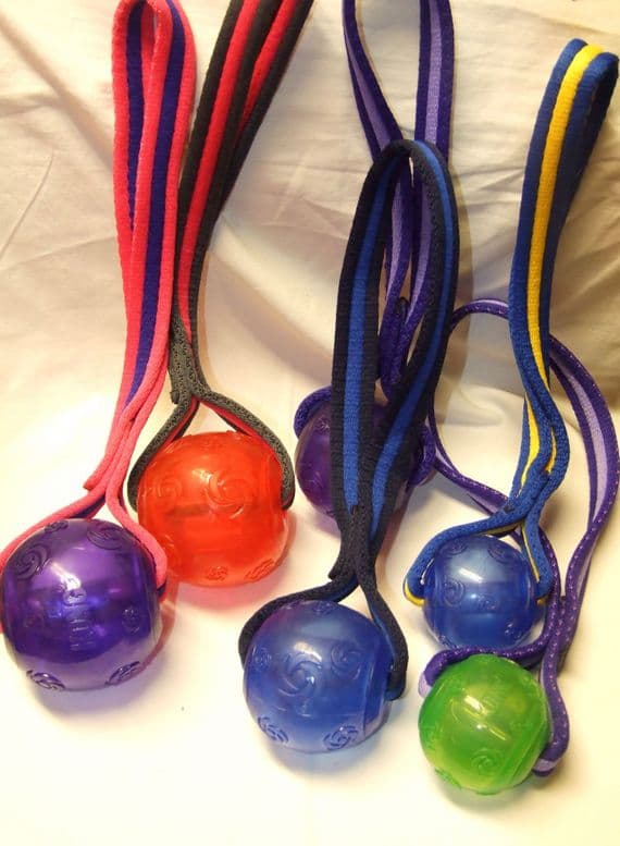 MEDIUM KONG SQUEEZZ BALL WITH WEBBING HANDLE