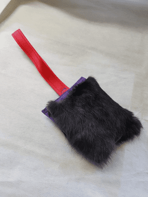 Pocket size  Rabbit squeaks on a handle