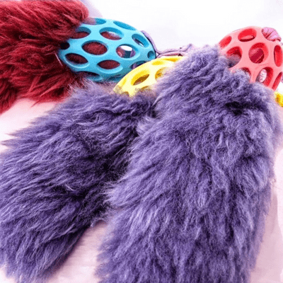 SHEEPSKIN BUNGEE TUGS +SMALL HOL-EE RUGBY BALL