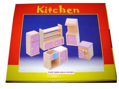 Pink dolls house kitchen set
