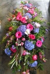 Cerise and Purple Casket Spray