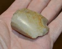 A blade end fragment from a Neolithic polished stone axe head , France. SOLD