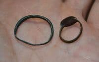 A cheap pair of Anglo Saxon bronze finger rings, one with coloured enamel, found in North Yorkshire. SOLD