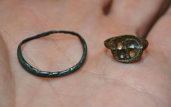 A cheap pair of Anglo Saxon bronze finger rings, one with coloured enamel, found in North Yorkshire. SOLD