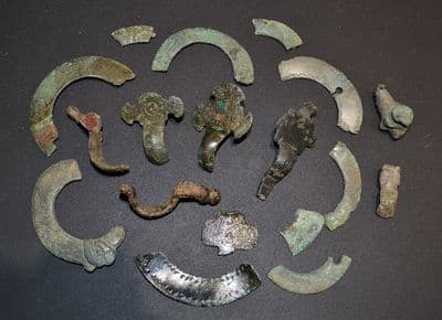 A fantastic value group of 18 x Anglo Saxon bronze Brooch segments found in North Yorkshire. SOLD