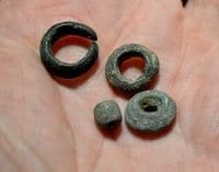 A good group of 4 x Late Bronze Age bronze beads / hair rings from Essex. SOLD