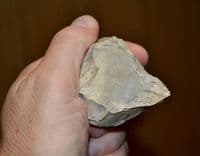 A good Mid-Palaeolithic heavy butted pointed flint hand axe, Overstrand, Norfolk. SOLD
