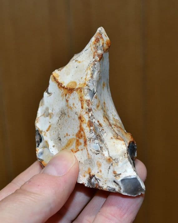 A good pointed Mid-Paleolithic flint pointed hand axe, Northrepps, Norfolk.