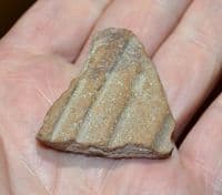 A good shard of Romano Egyptian pottery from small Amphora, Luxor, Egypt.