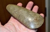 A good sized and superb Neolithic polished stone axe head from the Dordogne, France. SOLD