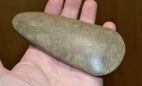 A good sized and superb Neolithic polished stone axe head from the Dordogne, France. SOLD