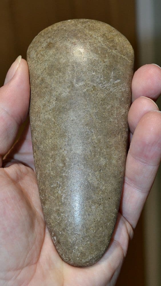 A good sized and superb Neolithic polished stone axe head from the Dordogne, France. SOLD