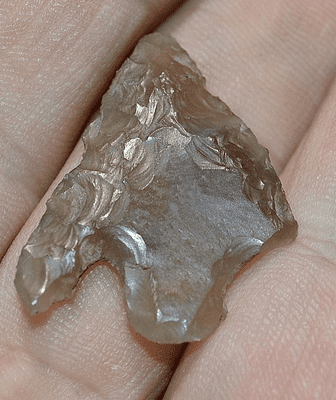 A good sized, attractive and translucent, Late Neolithic - Early Bronze age barbed and tanged flint arrowhead, found in Staffordshire.