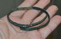 A good sized European Bronze Age bronze spiral bangle / armlet, SOLD