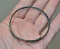 A good sized European Bronze Age bronze spiral bangle / armlet  SOLD