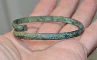 A good sized European Bronze Age bronze spiral bangle / armlet  SOLD