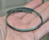 A good sized European Bronze Age bronze spiral bangle / armlet  SOLD
