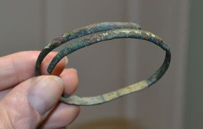 A good sized European Bronze Age bronze spiral bangle / armlet, SOLD