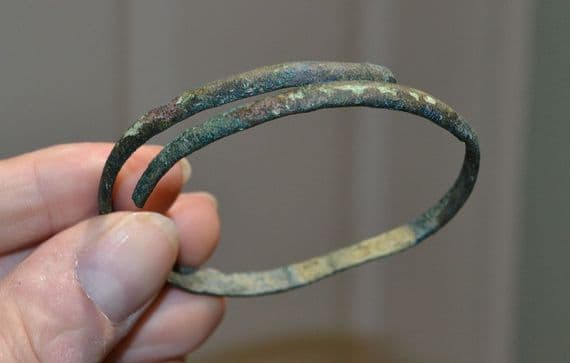 A good sized European Bronze Age bronze spiral bangle / armlet, SOLD
