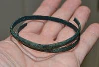 A good sized European Bronze Age bronze spiral bangle / armlet. SOLD
