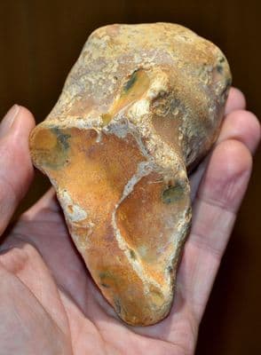 A heavy Lower Paleolithic chisel tipped unifacial pebble hand axe, Kimbridge Pit, Hants. (N112)
