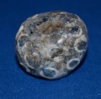A huge and very ornate Roman glass bead. SOLD