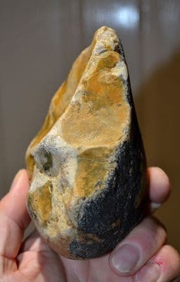 A huge, heavy and impressive Early Paleolithic pointed Stone Cobble chopper hand axe from Hampshire. SOLD
