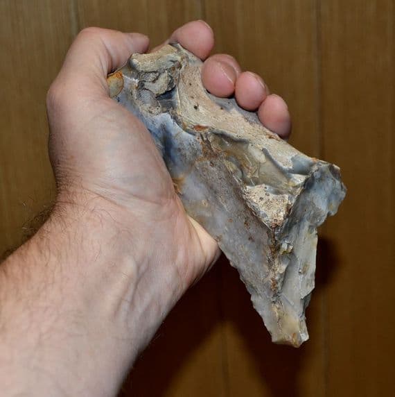 A huge Lower Paleolithic flint hand pick with fossil sponge inclusion, Hellesdon, Nr. Norwich.