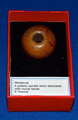 A large and attractive Medieval glazed pottery Spindle Whorl, River Thames, London. SOLD