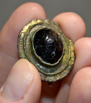 A large and attractive Roman bronze oval boss brooch with original black glass stone and some gilding remaining, Norfolk. SOLD
