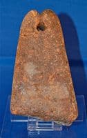 A large and heavy 16th Century red terracotta fishermans net weight. SOLD