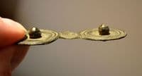 A large and impressive Roman military mount in the form of two conjoined circular shields with bosses, Germany. SOLD