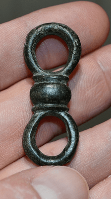 A large and pleasant Iron Age (Celtic) bronze double looped strap junction, Cambridgeshire