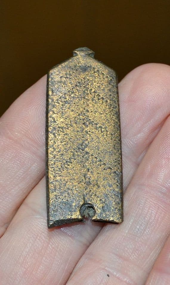 A large and pleasant Medieval bronze strap end with engraved design, River Thames, London. SOLD