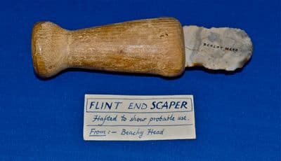 A large and pleasant Neolithic flint end scraper from Beachy Head, Sussex, hafted to show probable use. SOLD