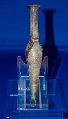A large and superb, elongate Roman blue/green glass perfume flask, Ex Charterhouse Public School Collection. SOLD