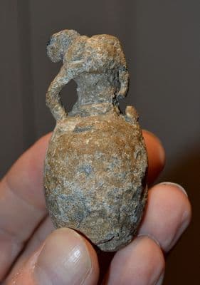 A large, heavy and unusual Roman solid lead votive amphora from Kent. SOLD