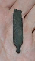 A large Medieval Bronze Strap end with some original strap within, Norfolk