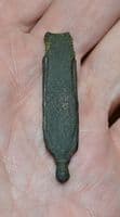 A large Medieval Bronze Strap end with some original strap within, Norfolk