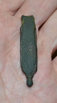 A large Medieval Bronze Strap end with some original strap within, Norfolk.