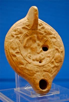 A large, rare and pleasant Roman buffware oil lamp featuring the Goddess Ceres and Scylla. SOLD
