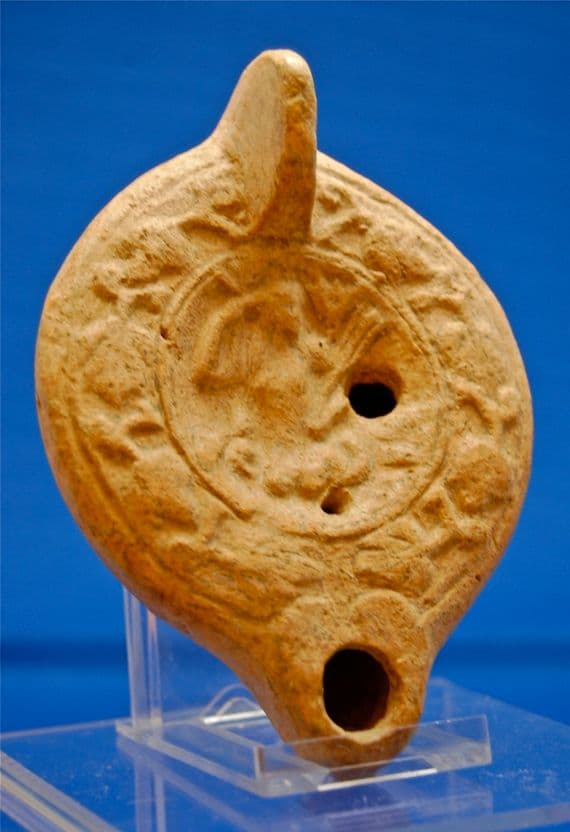 A large, rare and pleasant Roman buffware oil lamp featuring the Goddess Ceres and Scylla. SOLD
