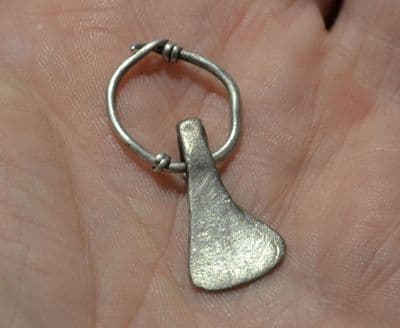 A large, scarce and superb Celtic silver Axe pendant on its original suspension hoop. SOLD