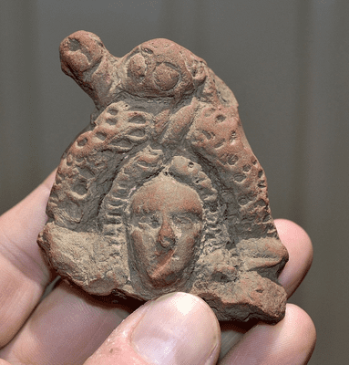 A large, well detailed and very ornate terrcotta bust of a Romano-Egyptian Goddess from a larger votive statuette, with a Turtle on her head. SOLD