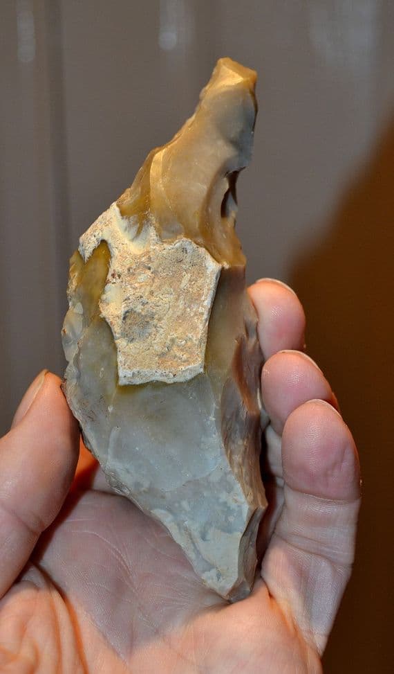 A large, well worked and excellent Mesolithic flint hand pick from Kent. SOLD
