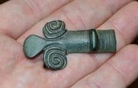 A large zoomorphic bronze terminal from a huge Anglo Saxon bronze cruciform brooch, Norfolk.